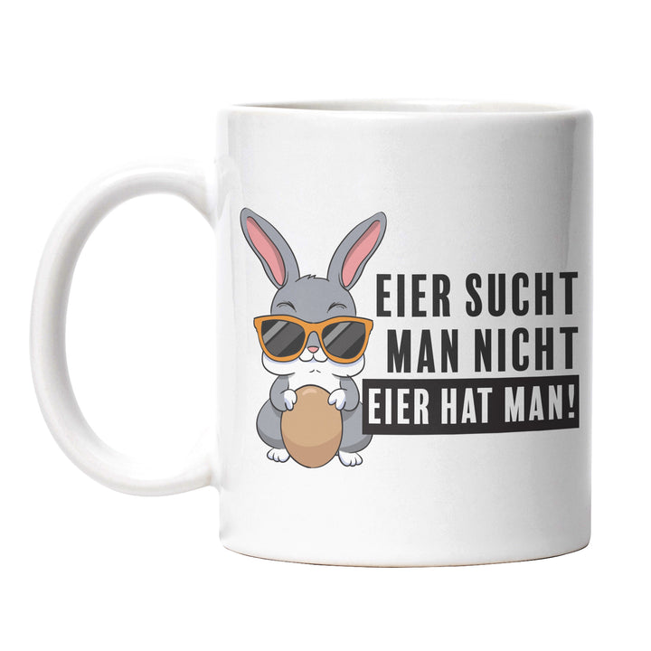 Lustige Tasse "Eier sucht man nicht, Eier hat man - mit Hase" – Perfekt für Ostern